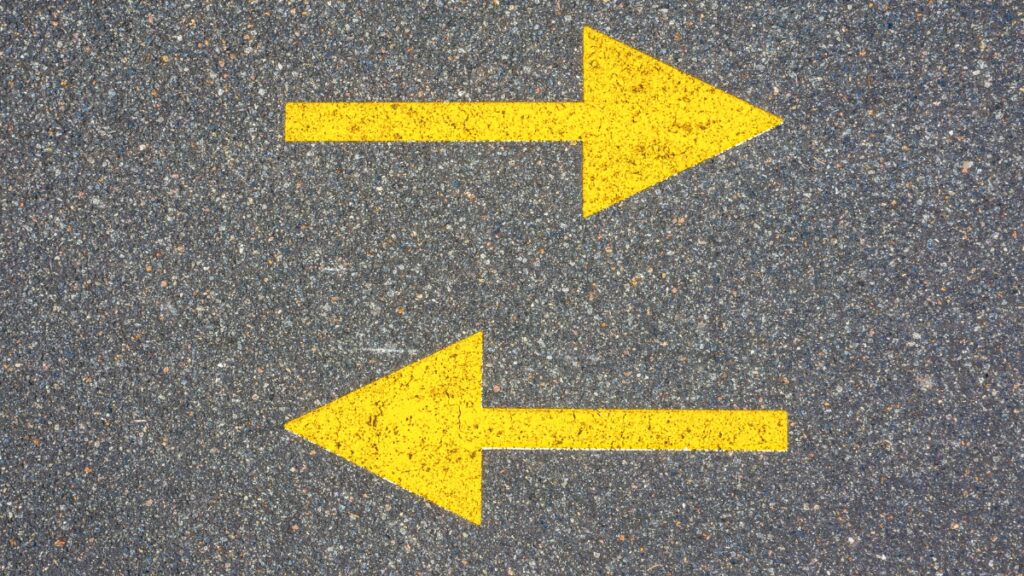two arrows going different directions
