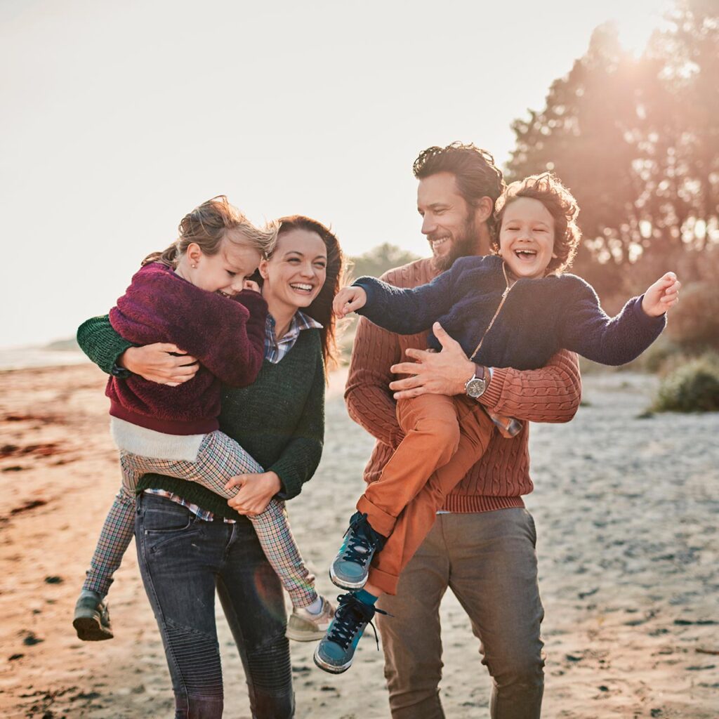 Financial Planning for Families Raising Children Walking on Beach